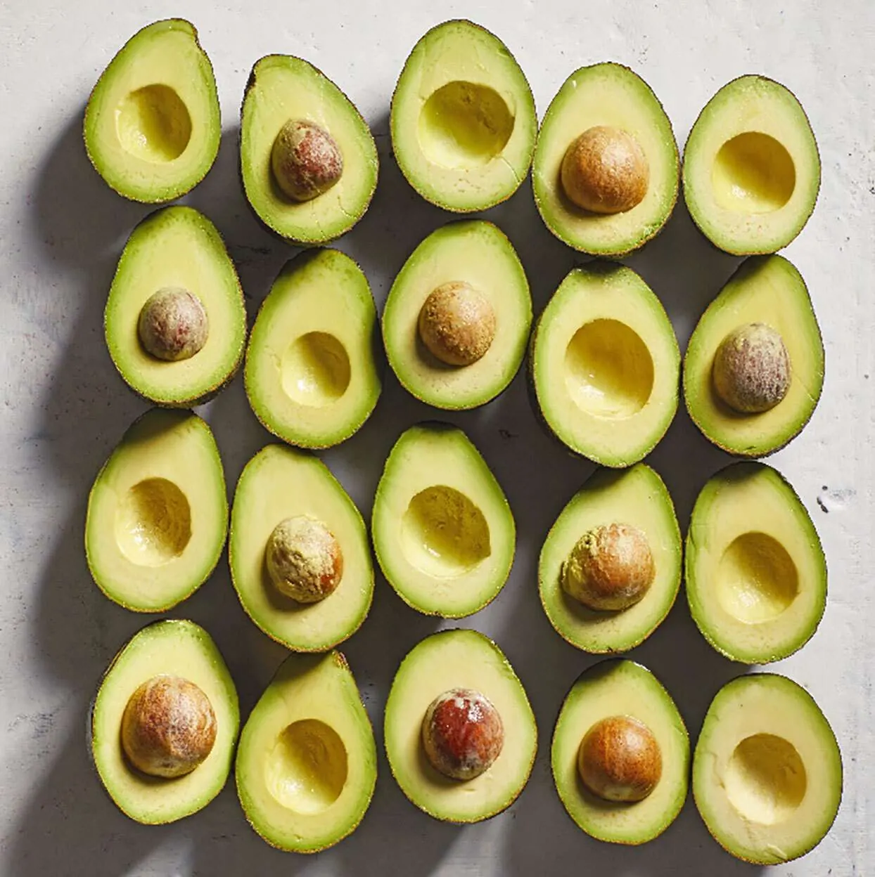 Cut avocados laid out for internal quality assessment